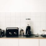 Top 10 Best Blenders for Frozen Margaritas at Home – Buyer’s Guide 2026 Stylish kitchen setup with a coffee maker and sleek design elements on a minimalist counter.